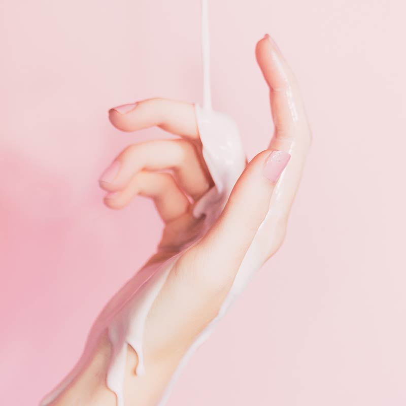 Lotion Dripping Down a Hand Lotion Dripping Down a Hand